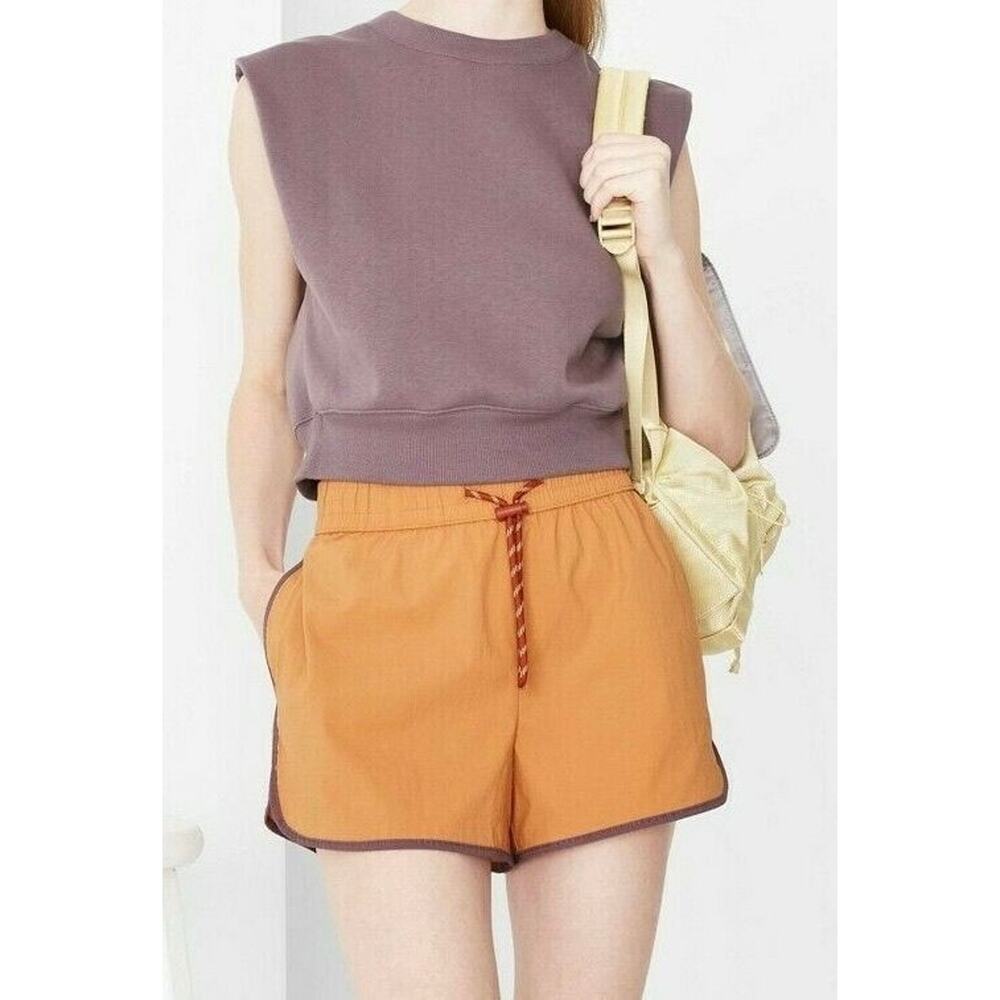 Wild Fable Women’s Woven Dolphin Shorts – Jewel Yam